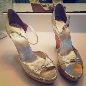 Authentic Gucci gold wedges